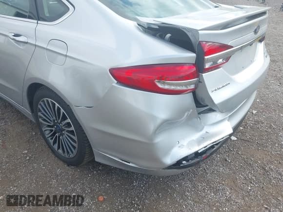 ✅ 2017 Ford Fusion Hybrid Titanium • VIN: 3FA6P0RU3HR188204 • Лот: 42618604. Опубликован ранее на IAAI с пробегом 104 609 миль. Бесплатный доступ к архиву аукционных продаж из США и подробный отчёт об истории автомобиля на DreamBid. Изображение 6.