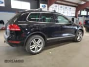 ✅ 2012 Volkswagen Touareg Sport • VIN: WVGEF9BP9CD011879 • Lot: 56903035. Listed on Copart with 198,262 mi. Free auction sales archive from the USA and detailed vehicle history report at DreamBid. Image 3.