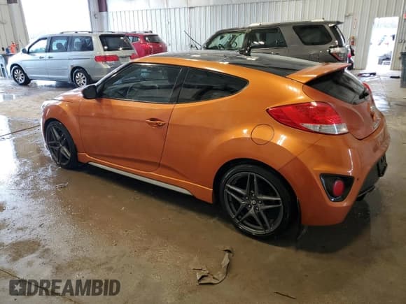 ✅ 2015 Hyundai Veloster Turbo • VIN: KMHTC6AE7FU225062 • Lot: 82557604. Wystawiony na Copart z przebiegiem 98 696 mil. Bezpłatny archiwum sprzedaży aukcyjnych z USA i szczegółowy raport historii pojazdu na DreamBid. Zdjęcie 2.