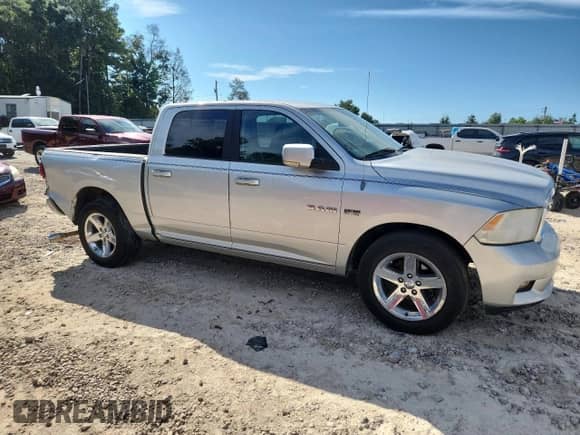2009 Dodge 1500 Sport with VIN 1D3HB13T69S710103, listed as a Copart auction lot 80182515 with 197,933 mi miles and Salvage title. Bid and sale history available at DreamBid. Image 4.