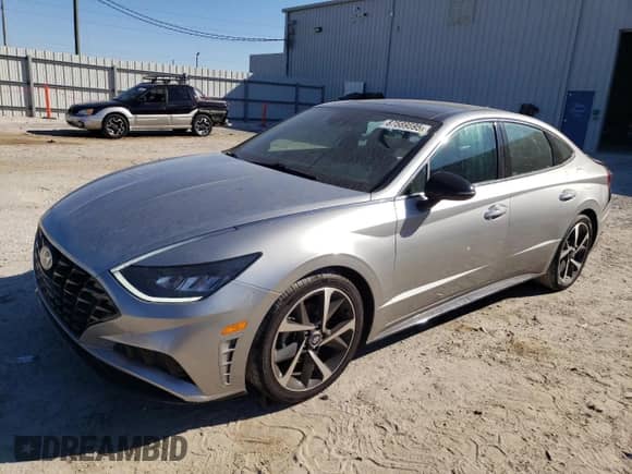 2022 Hyundai Sonata Sport z VIN 5NPEJ4J25NH140145, wystawiony jako Copart lot #87569595 z przebiegiem 26 203 mil mil oraz Szkoda całkowita • Salvage title. Historia ofert i sprzedaży dostępna na DreamBid. Obrazek 1.