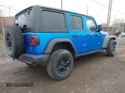 ✅ 2022 Jeep Wrangler Unlimited Sport S • VIN: 1C4HJXDG9NW116270 • Lot: 41227700. Listed on IAAI with 40,181 mi. Free auction sales archive from the USA and detailed vehicle history report at DreamBid. Image 4.