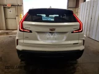 ✅ 2024 Cadillac XT4 AWD Luxury • VIN: 1GYFZBR43RF147208 • Лот: 89814265. Опубликован ранее на Copart с пробегом 3 028 миль. Бесплатный доступ к архиву аукционных продаж из США и подробный отчёт об истории автомобиля на DreamBid. Изображение 6.