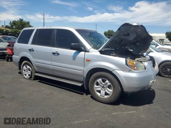 2006 Honda Pilot LX with VIN 2HKYF18136H556660, listed as a Copart auction lot 67755065 with 122,936 mi miles and Salvage title. Bid and sale history available at DreamBid. Image 4.