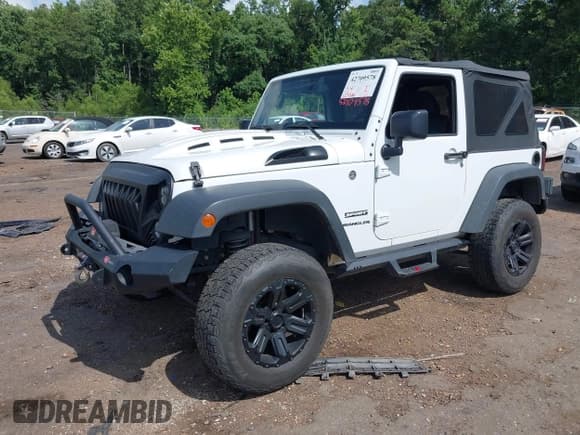✅ 2017 Jeep Wrangler Sport • VIN: 1C4GJWAG7HL669127 • Lot: 42709578. Listed on IAAI with 56,526 mi. Free auction sales archive from the USA and detailed vehicle history report at DreamBid. Image 17.
