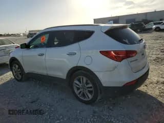 ✅ 2015 Hyundai Santa Fe • VIN: 5XYZW4LA7FG295232 • Лот: 42368973. Опубликован ранее на Copart с пробегом Не указан. Бесплатный доступ к архиву аукционных продаж из США и подробный отчёт об истории автомобиля на DreamBid. Изображение 2.