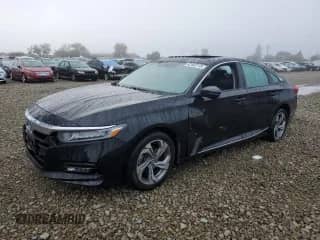2018 Honda Accord EX-L z VIN 1HGCV1F57JA100293, wystawiony jako Copart lot #82453115 z przebiegiem 112 176 mil mil oraz Szkoda całkowita • Salvage title. Historia ofert i sprzedaży dostępna na DreamBid. Obrazek 1.