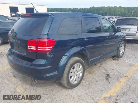 2015 Dodge Journey American Value z VIN 3C4PDCABXFT610861, wystawiony jako IAAI lot #43068421 z przebiegiem 153 937 mil mil oraz . Historia ofert i sprzedaży dostępna na DreamBid. Obrazek 4.