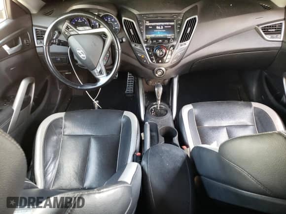 2015 Hyundai Veloster Turbo с VIN KMHTC6AE4FU221955, выставлен на аукционе Copart как лот 68837093 с пробегом 103 482 миль миль и . История ставок и продаж доступна на DreamBid. Изображение 8.