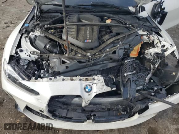 ✅ 2022 BMW M4 • VIN: WBS53AZ05NCH86997 • Lot: 65124395. Listed on Copart with 69,657 mi. Free auction sales archive from the USA and detailed vehicle history report at DreamBid. Image 11.