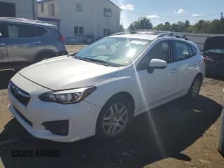 ✅ 2017 Subaru Impreza Premium • VIN: 4S3GTAD61H3729306 • Lot: 80734975. Listed on Copart with 132,659 mi. Free auction sales archive from the USA and detailed vehicle history report at DreamBid. Image 1.