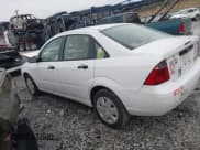 ✅ 2007 Ford Focus S • VIN: 1FAHP34N57W355068 • Lot: 43735746. Listed on IAAI with 126,471 mi. Free auction sales archive from the USA and detailed vehicle history report at DreamBid. Image 14.