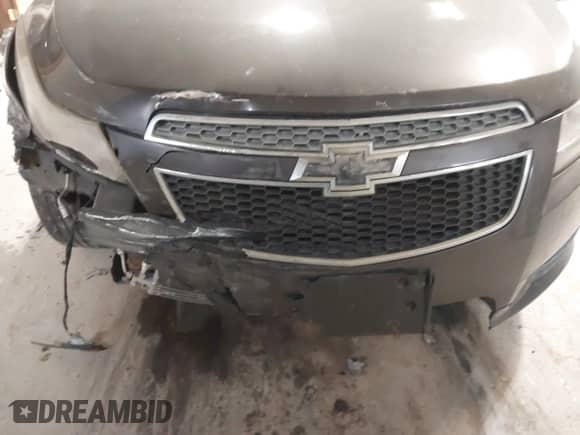 2014 Chevrolet Cruze LS with VIN 1G1PA5SH9E7206114, listed as a IAAI auction lot 41509761 with 216,727 mi miles and . Bid and sale history available at DreamBid. Image 6.