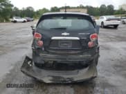 ✅ 2012 Chevrolet Sonic LTZ • VIN: 1G1JE6SH1C4132511 • Lot: 58445765. Listed on Copart with 82,611 mi. Free auction sales archive from the USA and detailed vehicle history report at DreamBid. Image 6.