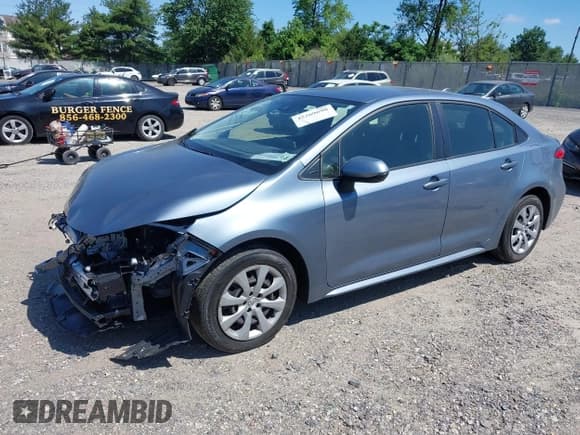 ✅ 2021 Toyota Corolla LE • VIN: JTDEPMAE7MJ144664 • Lot: 42269698. Wystawiony na IAAI z przebiegiem 23 500 mil. Bezpłatny archiwum sprzedaży aukcyjnych z USA i szczegółowy raport historii pojazdu na DreamBid. Zdjęcie 2.