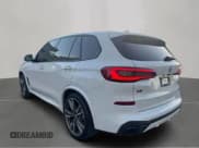 ✅ 2020 BMW X5 M50i • VIN: 5UXJU4C0XLLE45698 • Лот: 86595285. Опубликован ранее на Copart с пробегом 105 475 миль. Бесплатный доступ к архиву аукционных продаж из США и подробный отчёт об истории автомобиля на DreamBid. Изображение 3.