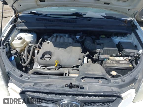 ✅ 2008 Kia Rondo LX • VIN: KNAFG526X87151416 • Lot: 42561032. Wystawiony na IAAI z przebiegiem 172 191 mil. Bezpłatny archiwum sprzedaży aukcyjnych z USA i szczegółowy raport historii pojazdu na DreamBid. Zdjęcie 10.