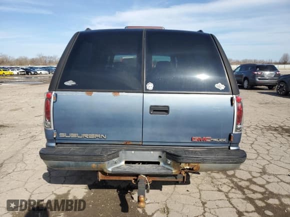 ✅ 1997 GMC Suburban • VIN: 1GKFK16R7VJ707618 • Lot: 49882035. Wystawiony na Copart z przebiegiem 317 771 mil. Bezpłatny archiwum sprzedaży aukcyjnych z USA i szczegółowy raport historii pojazdu na DreamBid. Zdjęcie 6.