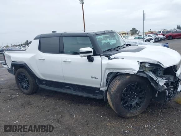 ✅ 2025 GMC HUMMER EV Pickup 2X • VIN: 1GT10BDDXSU102382 • Lot: 41798570. Wystawiony na IAAI z przebiegiem 4 806 mil. Bezpłatny archiwum sprzedaży aukcyjnych z USA i szczegółowy raport historii pojazdu na DreamBid. Zdjęcie 14.