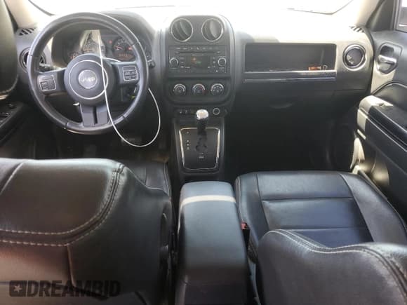 ✅ 2015 Jeep Patriot Latitude • VIN: 1C4NJPFA5FD107297 • Lot: 55774155. Listed on Copart with 144,240 mi. Free auction sales archive from the USA and detailed vehicle history report at DreamBid. Image 8.