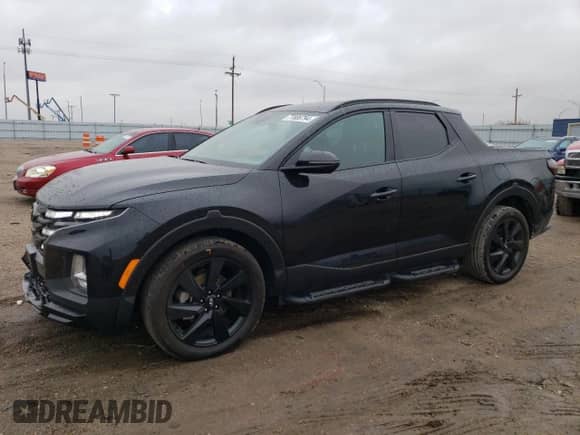 2023 Hyundai Santa Cruz Night Edition с VIN 5NTJCDAF4PH045429, выставлен на аукционе Copart как лот 77806794 с пробегом 12 240 миль миль и Списание • Salvage title. История ставок и продаж доступна на DreamBid. Изображение 1.