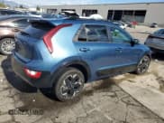 ✅ 2023 Kia Niro Wind • VIN: KNDCR3L11P5022658 • Лот: 93421825. Опубликован ранее на Copart с пробегом 61 203 миль. Бесплатный доступ к архиву аукционных продаж из США и подробный отчёт об истории автомобиля на DreamBid. Изображение 3.