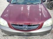 ✅ 2004 Mazda Tribute LX • VIN: 4F2YZ94184KM33916 • Lot: 70839734. Listed on Copart with Not provided. Free auction sales archive from the USA and detailed vehicle history report at DreamBid. Image 11.