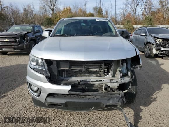✅ 2019 Chevrolet Colorado 4WD Z71 • VIN: 1GCGTDEN2K1267185 • Лот: 76899464. Опубликован ранее на Copart с пробегом 129 017 миль. Бесплатный доступ к архиву аукционных продаж из США и подробный отчёт об истории автомобиля на DreamBid. Изображение 5.