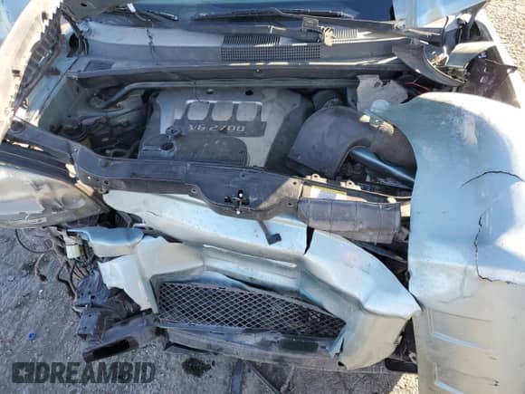 2006 Hyundai Tucson GLS z VIN KM8JN12D16U461376, wystawiony jako Copart lot #82132324 z przebiegiem 127 474 mil mil oraz Szkoda całkowita • Salvage title. Historia ofert i sprzedaży dostępna na DreamBid. Obrazek 11.