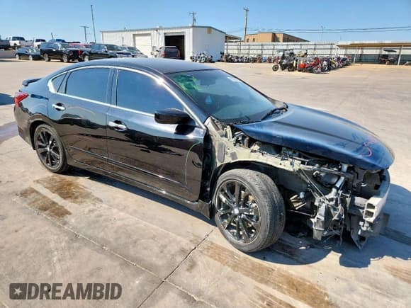 ✅ 2018 Nissan Altima SL • VIN: 1N4AL3AP0JC236260 • Lot: 81987325. Listed on Copart with 98,878 mi. Free auction sales archive from the USA and detailed vehicle history report at DreamBid. Image 4.