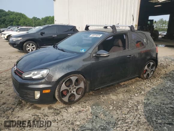 ✅ 2012 Volkswagen Golf GTI w/Conv & Sunroof • VIN: WVWEV7AJ7CW009478 • Lot: 58974025. Listed on Copart with 124,472 mi. Free auction sales archive from the USA and detailed vehicle history report at DreamBid. Image 1.