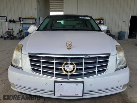 ✅ 2006 Cadillac DTS 1SC • VIN: 1G6KD57Y06U108774 • Лот: 91999725. Опубликован ранее на Copart с пробегом 99 135 миль. Бесплатный доступ к архиву аукционных продаж из США и подробный отчёт об истории автомобиля на DreamBid. Изображение 5.