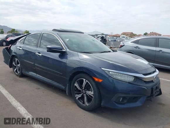 ✅ 2017 Honda Civic Touring • VIN: 19XFC1F97HE024456 • Lot: 43241274. Listed on IAAI with 181,400 mi. Free auction sales archive from the USA and detailed vehicle history report at DreamBid. Image 1.