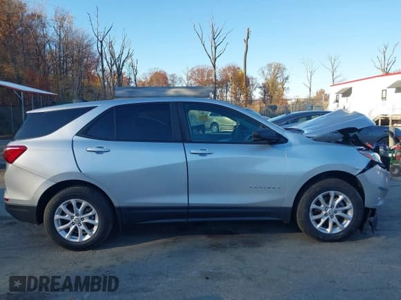 ✅ 2021 Chevrolet Equinox LS • VIN: 3GNAXSEV3MS161254 • Lot: 43621600. Listed on IAAI with 74,452 mi. Free auction sales archive from the USA and detailed vehicle history report at DreamBid. Image 13.