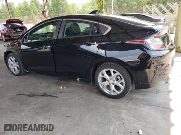 2017 Chevrolet Volt Premier z VIN 1G1RB6S52HU110879, wystawiony jako Copart lot #61268583 z przebiegiem 89 840 mil mil oraz . Historia ofert i sprzedaży dostępna na DreamBid. Obrazek 2.