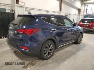 ✅ 2018 Hyundai Santa Fe Ultimate • VIN: 5XYZWDLA1JG507521 • Лот: 91259025. Опубликован ранее на Copart с пробегом 143 697 миль. Бесплатный доступ к архиву аукционных продаж из США и подробный отчёт об истории автомобиля на DreamBid. Изображение 3.