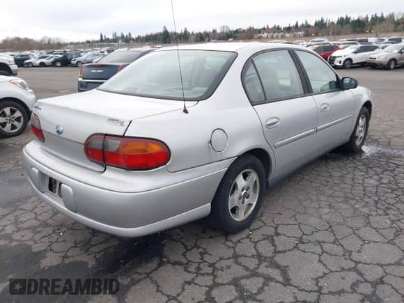 2003 Chevrolet Malibu z VIN 1G1ND52J83M637480, wystawiony jako IAAI lot #41786924 z przebiegiem 91 923 mil mil oraz . Historia ofert i sprzedaży dostępna na DreamBid. Obrazek 4.