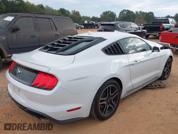 ✅ 2021 Ford Mustang EcoBoost • VIN: 1FA6P8TH9M5101140 • Lot: 43309485. Listed on IAAI with 69,861 mi. Free auction sales archive from the USA and detailed vehicle history report at DreamBid. Image 4.