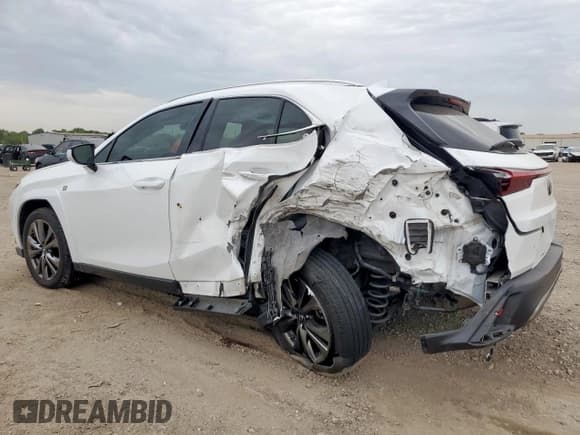 ✅ 2022 Lexus UX 200 F Sport • VIN: JTHE3JBH7N2047381 • Лот: 65420715. Опубликован ранее на Copart с пробегом 71 864 миль. Бесплатный доступ к архиву аукционных продаж из США и подробный отчёт об истории автомобиля на DreamBid. Изображение 2.