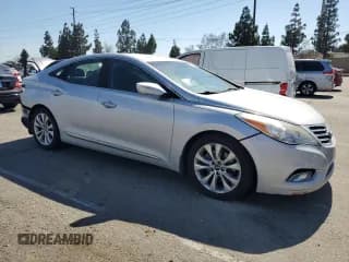 ✅ 2014 Hyundai Azera Limited • VIN: KMHFH4JG9EA418754 • Лот: 64101695. Опубликован ранее на Copart с пробегом 98 647 миль. Бесплатный доступ к архиву аукционных продаж из США и подробный отчёт об истории автомобиля на DreamBid. Изображение 4.