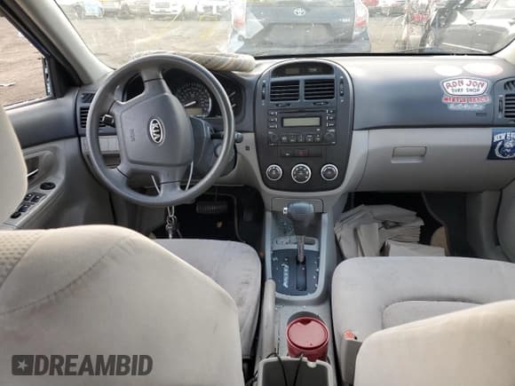 ✅ 2008 Kia Spectra EX • VIN: KNAFE122185545457 • Лот: 74593424. Опубликован ранее на Copart с пробегом 123 421 миль. Бесплатный доступ к архиву аукционных продаж из США и подробный отчёт об истории автомобиля на DreamBid. Изображение 8.