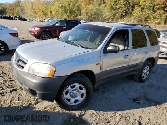 ✅ 2001 Mazda Tribute • VIN: 4F2YU06141KM32636 • Lot: 75809004. Listed on Copart with 167,945 mi. Free auction sales archive from the USA and detailed vehicle history report at DreamBid. Image 1.