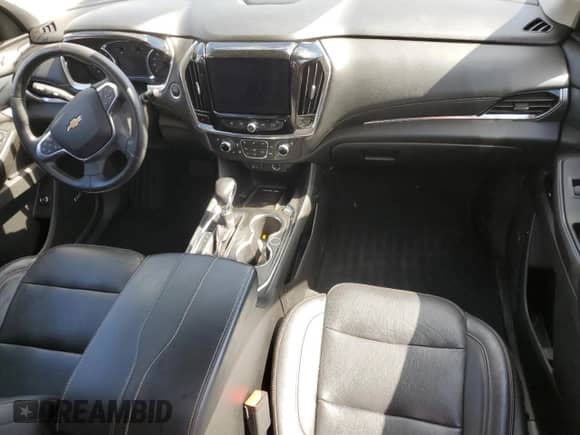 2021 Chevrolet Traverse Premier z VIN 1GNERKKW6MJ238743, wystawiony jako Copart lot #57995125 z przebiegiem 61 096 mil mil oraz Szkoda całkowita • Salvage title. Historia ofert i sprzedaży dostępna na DreamBid. Obrazek 8.