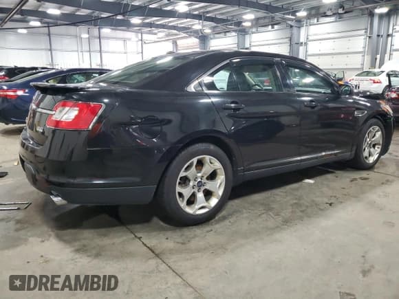 ✅ 2011 Ford Taurus SHO • VIN: 1FAHP2KT9BG102768 • Лот: 64282555. Опубликован ранее на Copart с пробегом 218 184 миль. Бесплатный доступ к архиву аукционных продаж из США и подробный отчёт об истории автомобиля на DreamBid. Изображение 3.