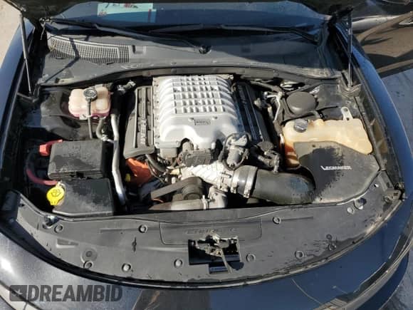 2015 Dodge Charger SRT Hellcat z VIN 2C3CDXL94FH824869, wystawiony jako Copart lot #53563535 z przebiegiem 61 148 mil mil oraz Szkoda całkowita • Salvage title. Historia ofert i sprzedaży dostępna na DreamBid. Obrazek 11.