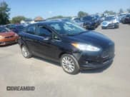 ✅ 2017 Ford Fiesta Titanium • VIN: 3FADP4CJ5HM158616 • Lot: 71231215. Wystawiony na Copart z przebiegiem 80 753 mil. Bezpłatny archiwum sprzedaży aukcyjnych z USA i szczegółowy raport historii pojazdu na DreamBid. Zdjęcie 4.