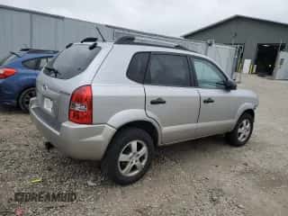 2005 Hyundai Tucson GL z VIN KM8JM12B75U146582, wystawiony jako Copart lot #82966094 z przebiegiem 132 445 mil mil oraz Nie do naprawy • Non repairable. Historia ofert i sprzedaży dostępna na DreamBid. Obrazek 3.