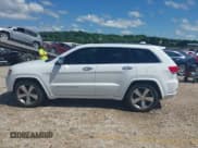 ✅ 2014 Jeep Grand Cherokee Overland • VIN: 1C4RJFCG0EC238873 • Lot: 42436535. Listed on IAAI with 154,384 mi. Free auction sales archive from the USA and detailed vehicle history report at DreamBid. Image 14.