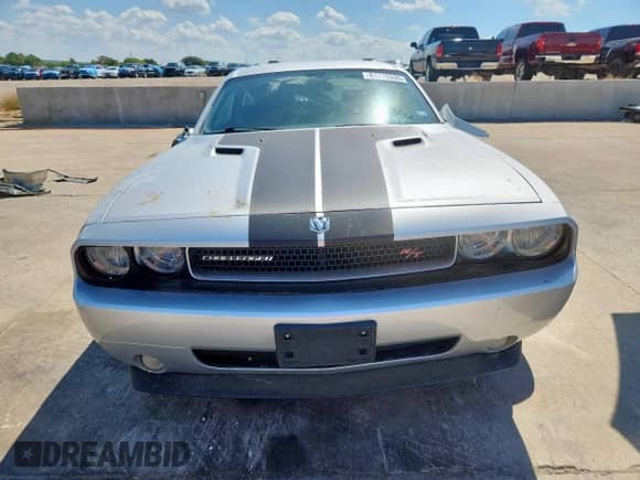 2009 Dodge Challenger R/T with VIN 2B3LJ54T79H602061, listed as a Copart auction lot 81770335 with 69,701 mi miles and Salvage title. Bid and sale history available at DreamBid. Image 5.
