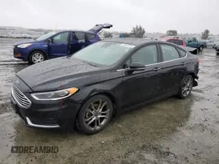 ✅ 2020 Ford Fusion SEL • VIN: 3FA6P0CD4LR131527 • Лот: 92422235. Опубликован ранее на Copart с пробегом 117 702 миль. Бесплатный доступ к архиву аукционных продаж из США и подробный отчёт об истории автомобиля на DreamBid. Изображение 1.